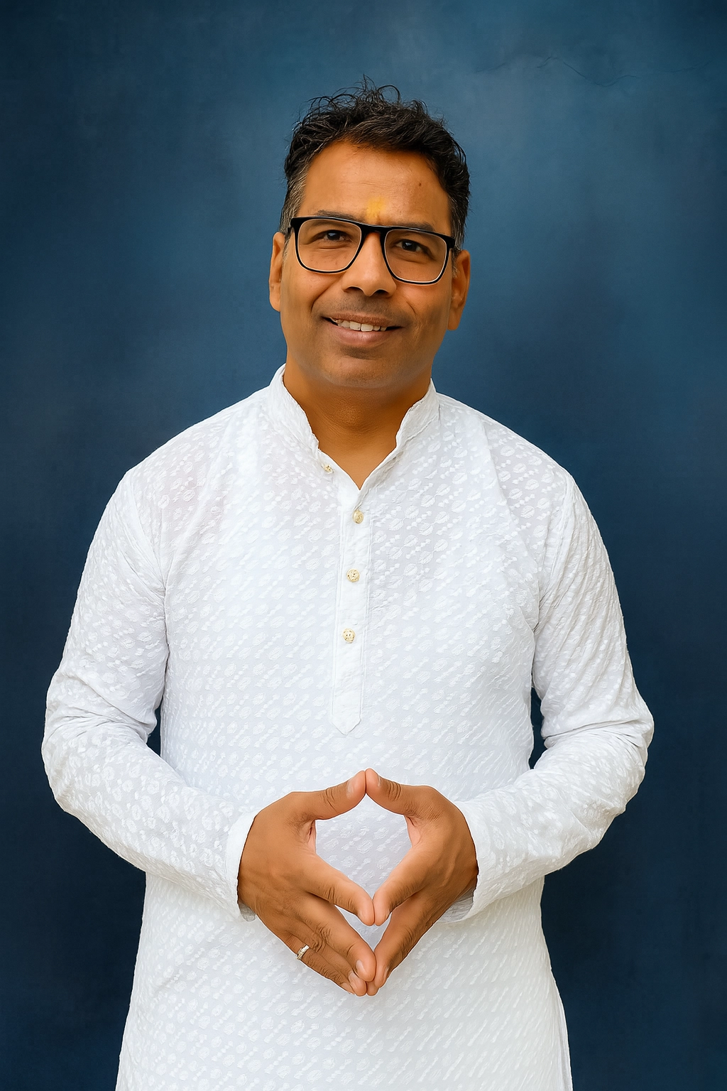 Sandeep Kumar, astrology expert in Horoscope, Vastu, Bhrigu Nandi Nadi, and Kundali Milan, wearing white traditional kurta